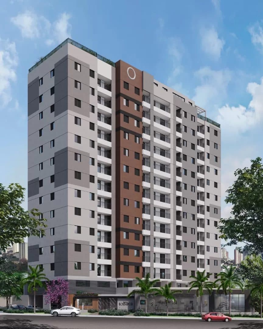 Vista externa da fachada do edifício com design moderno e tons de cinza e marrom.