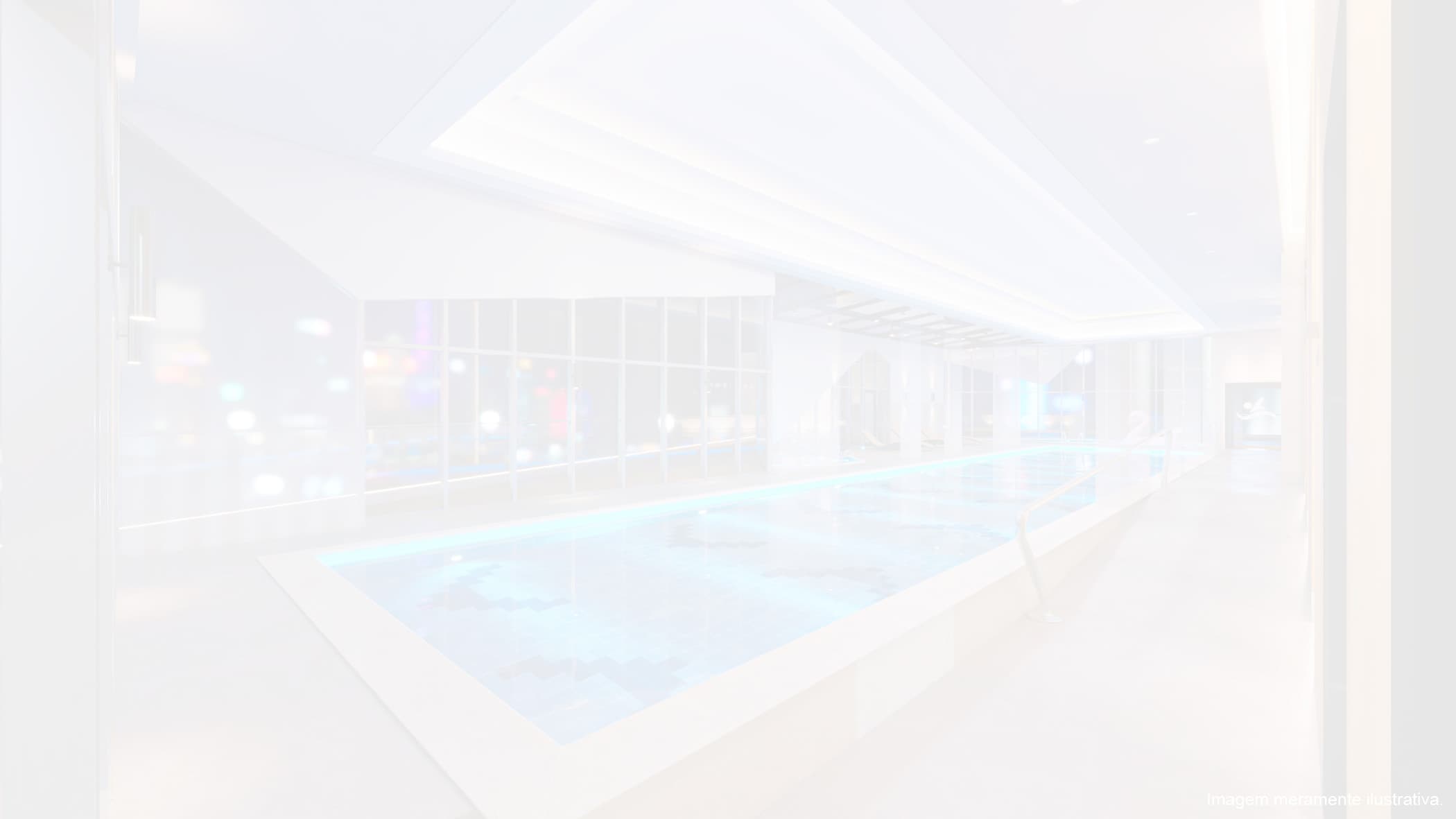 Piscina coberta com iluminação suave e design moderno.