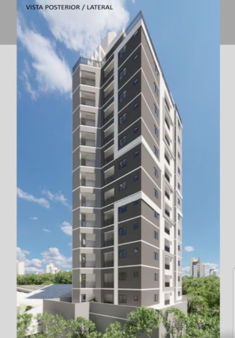 Perspectiva da fachada lateral de edifício residencial com acabamento em tons de cinza e branco.